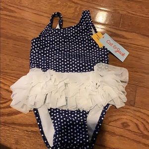 Blue and white polka dot bathing suit